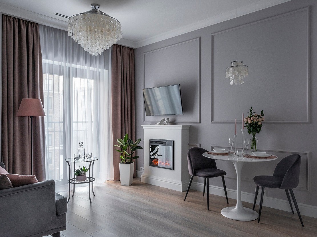 Гостиная и спальня в одном: маленькая квартира-трансформер в смелых цветах в Норвегии